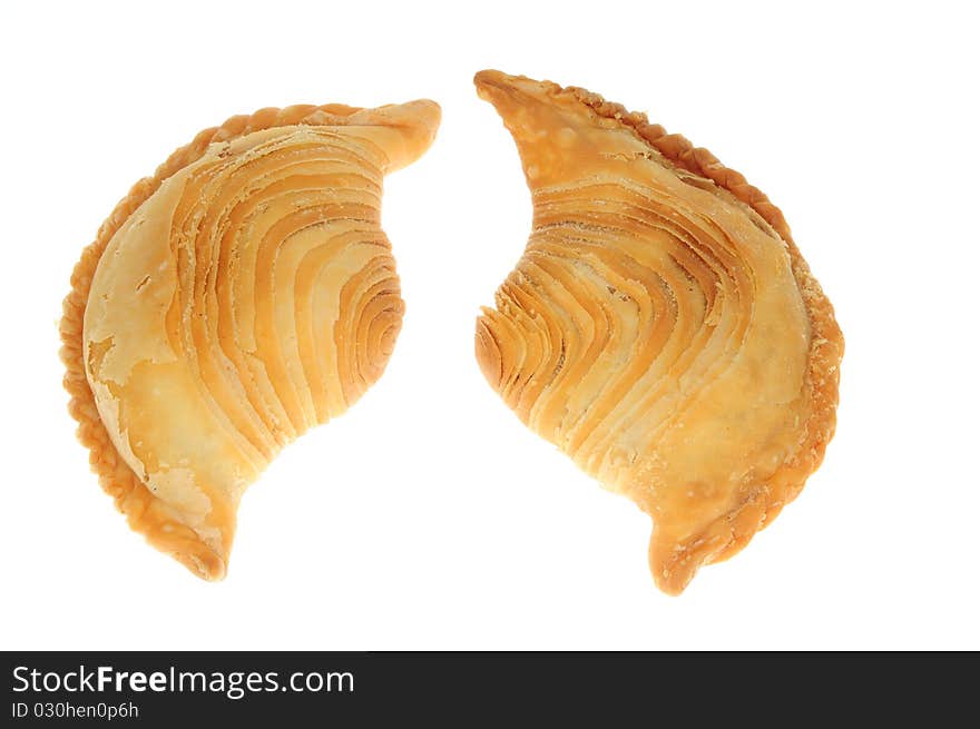 Two Crispy Curry Puff On A White Background