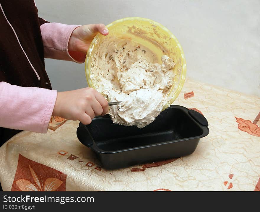 Putting A Dough Into A Cake Pan