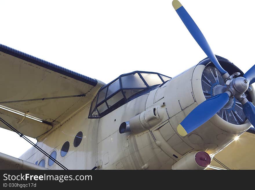 Cockpit of vintage biplane with blue propeller. Cockpit of vintage biplane with blue propeller.