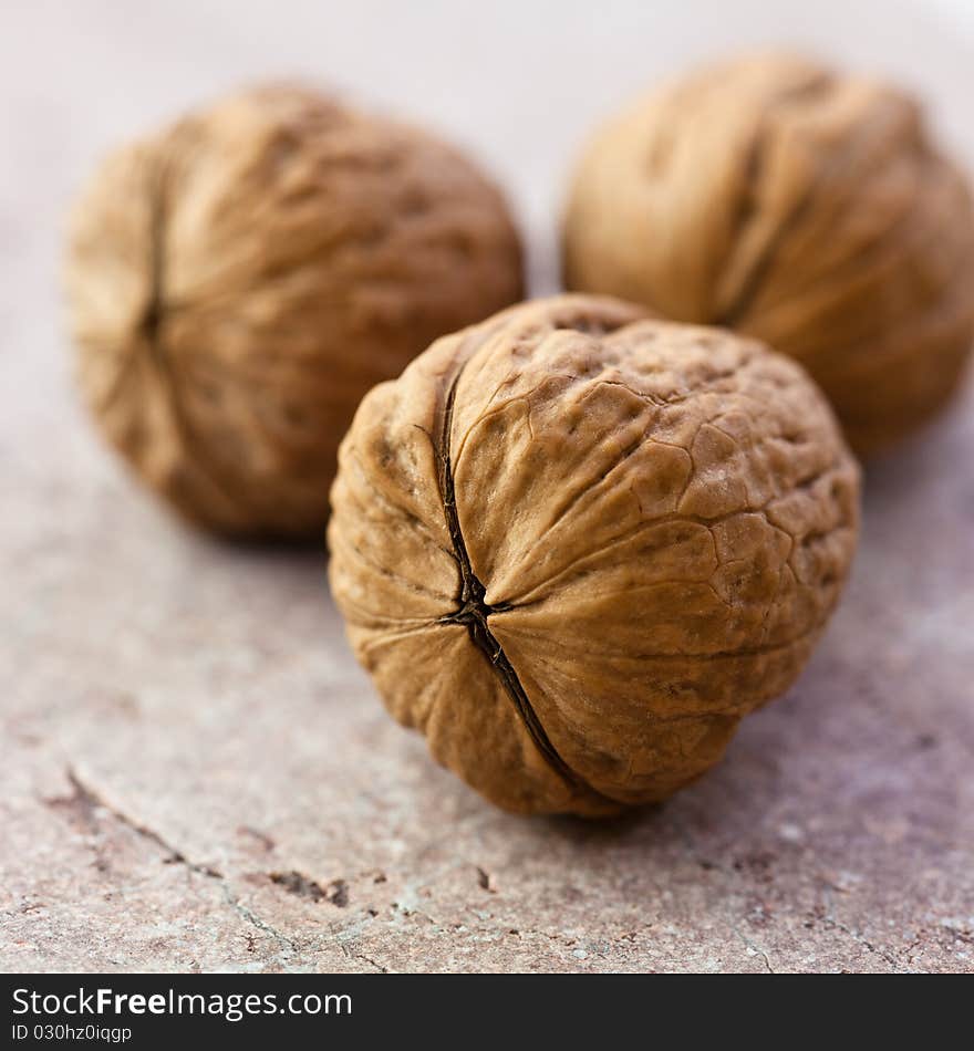 Closeup of walnuts ona stone background