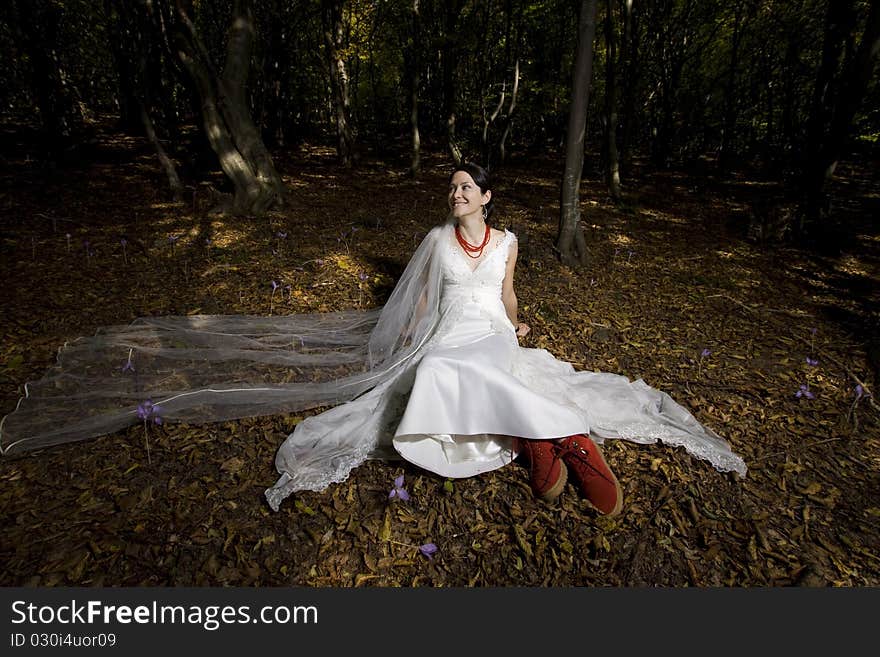 Trash the dress in autumn forest