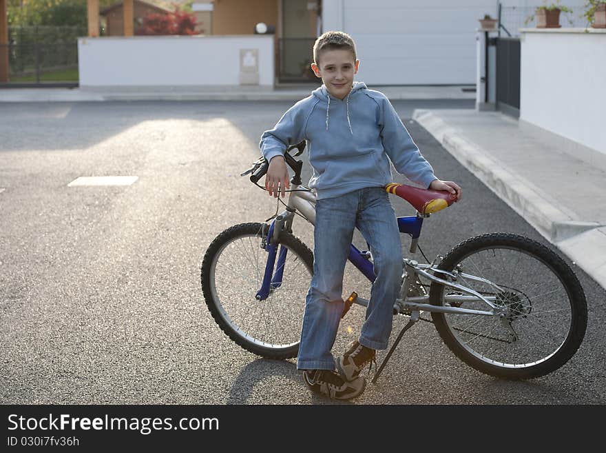 Little boy with his bike. Little boy with his bike