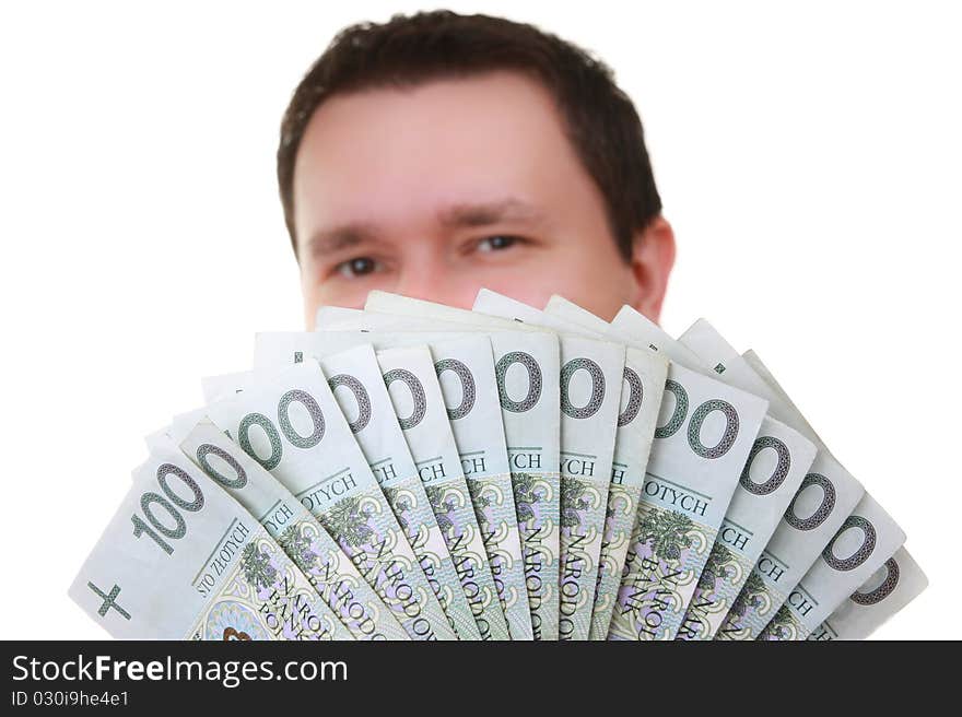 A bunch of polish money. Banknotes in denominations of 100th. Face in background. A bunch of polish money. Banknotes in denominations of 100th. Face in background.