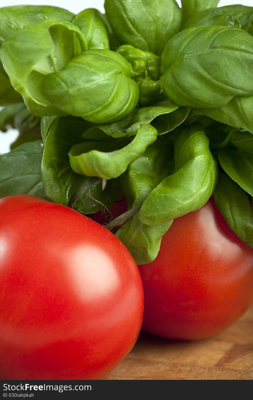 Green Basil And Red Tomatoes