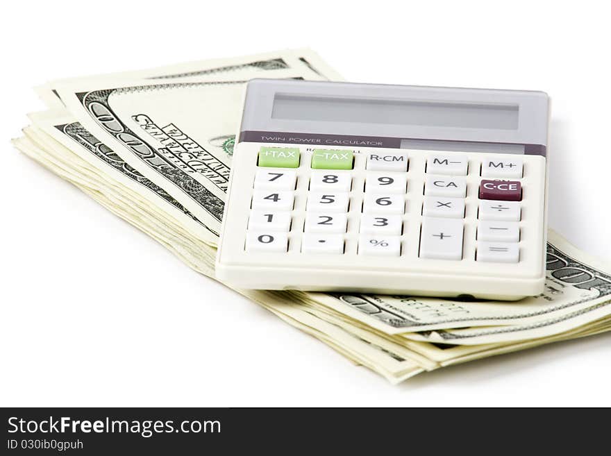 Business concept. Dollars; calculator on white background