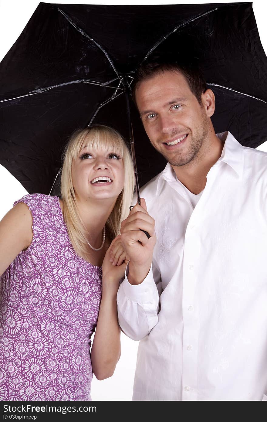 Happy couple under umbrella