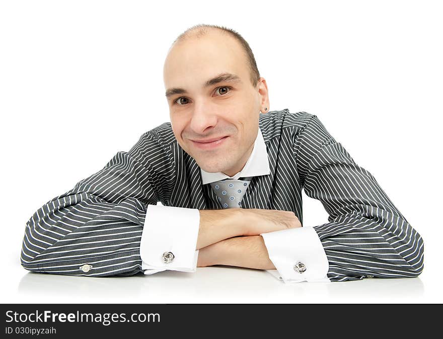 Smiling handsome businessman. Isolated over white background