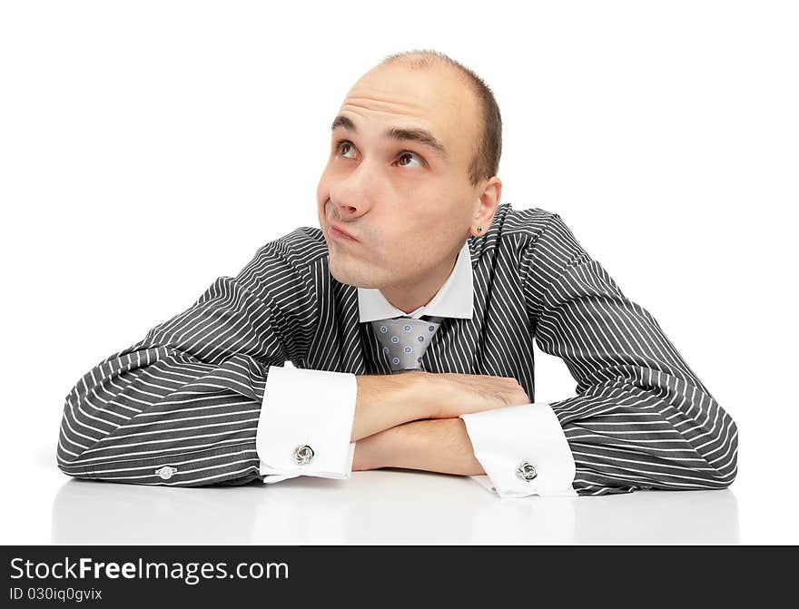 Portrait of handsome young thoughtful businessman