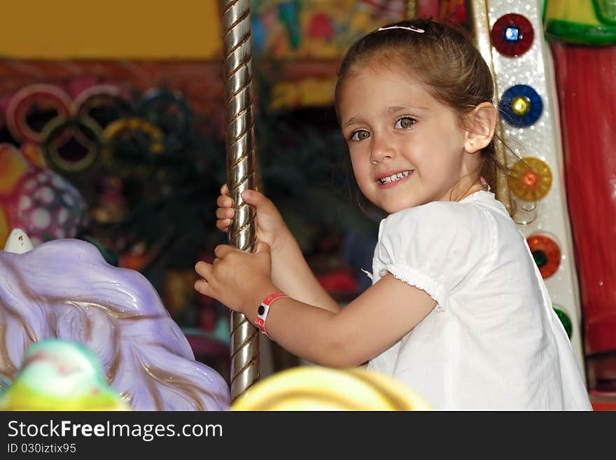 Child in carousel