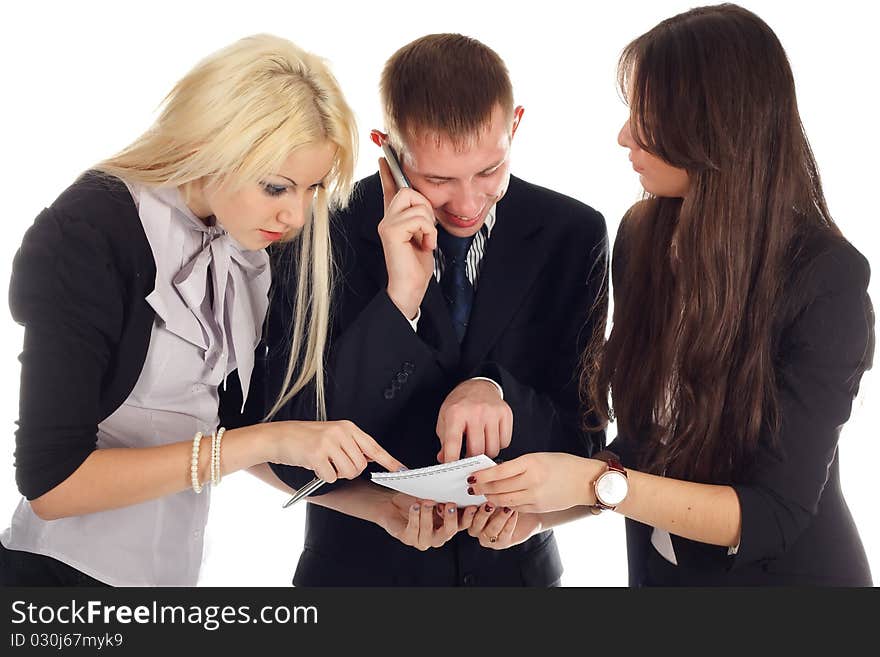 The business team isolated on white background. One business man and two woman.