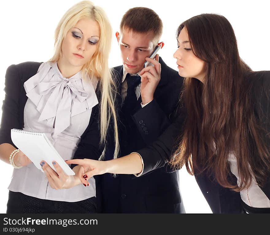 The business team isolated on white background. One business man and two woman.