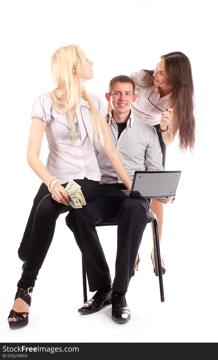 The business team isolated on white background. One business man and two woman.