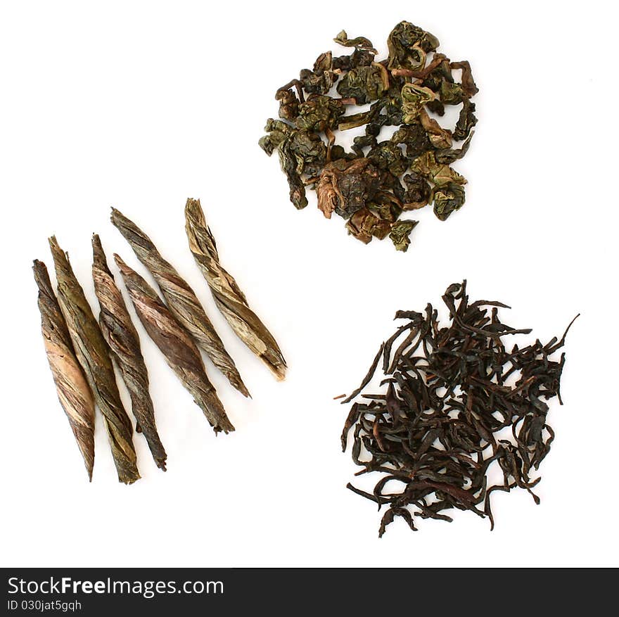 Three handfuls of tea (Oolong tea, Jade's Spindle (Green Spindle), black) isolated on white background. Three handfuls of tea (Oolong tea, Jade's Spindle (Green Spindle), black) isolated on white background.