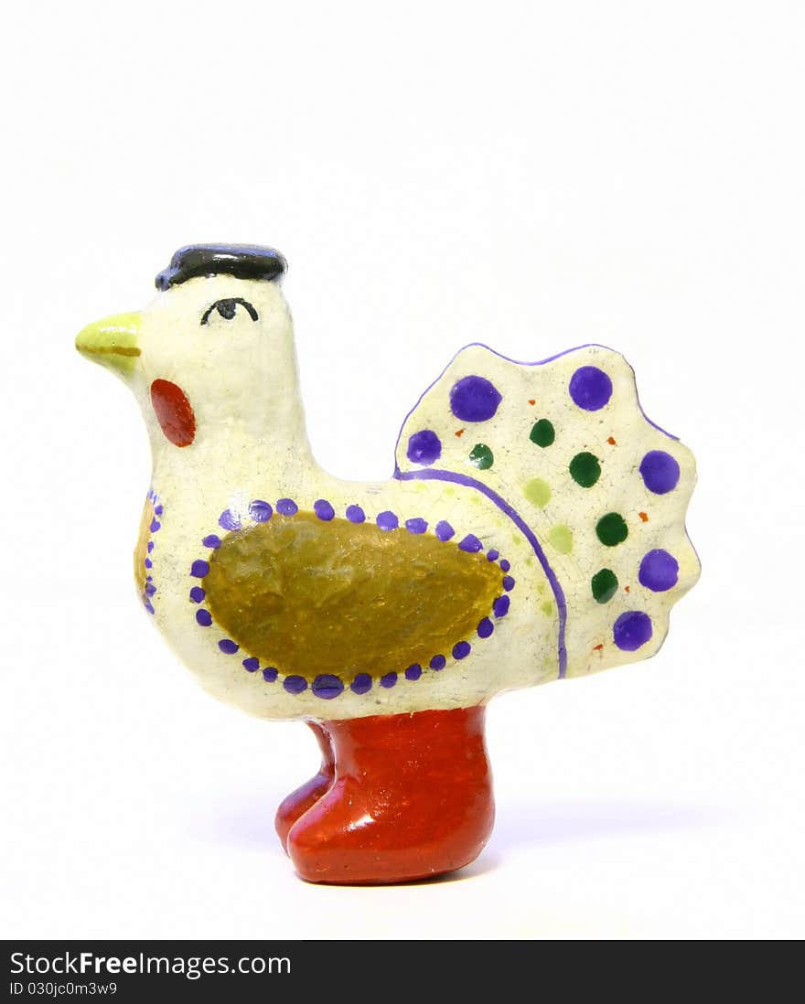 Toy white chicken in red boots, small ceramic statue