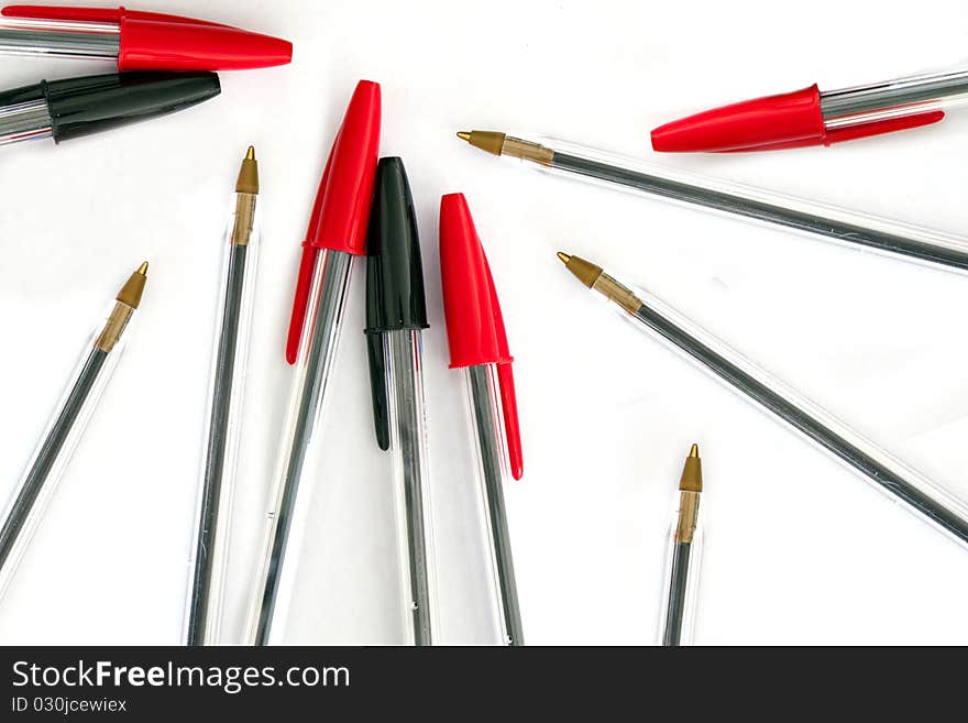 Black feathers and red on a white background. Black feathers and red on a white background