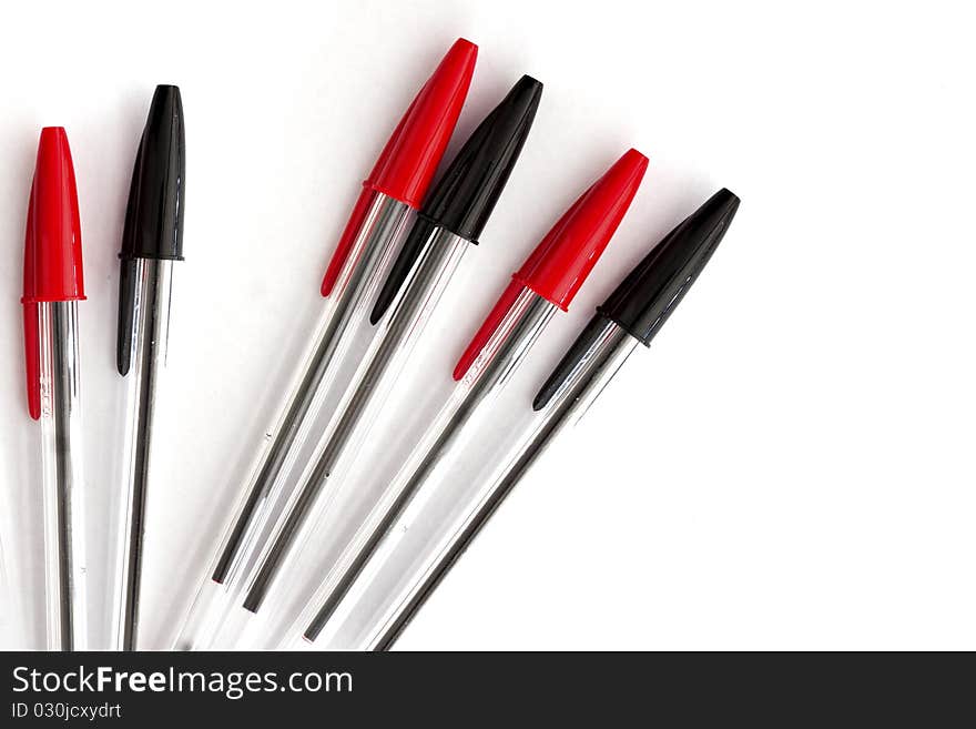 Black feathers and red on a white background. Black feathers and red on a white background