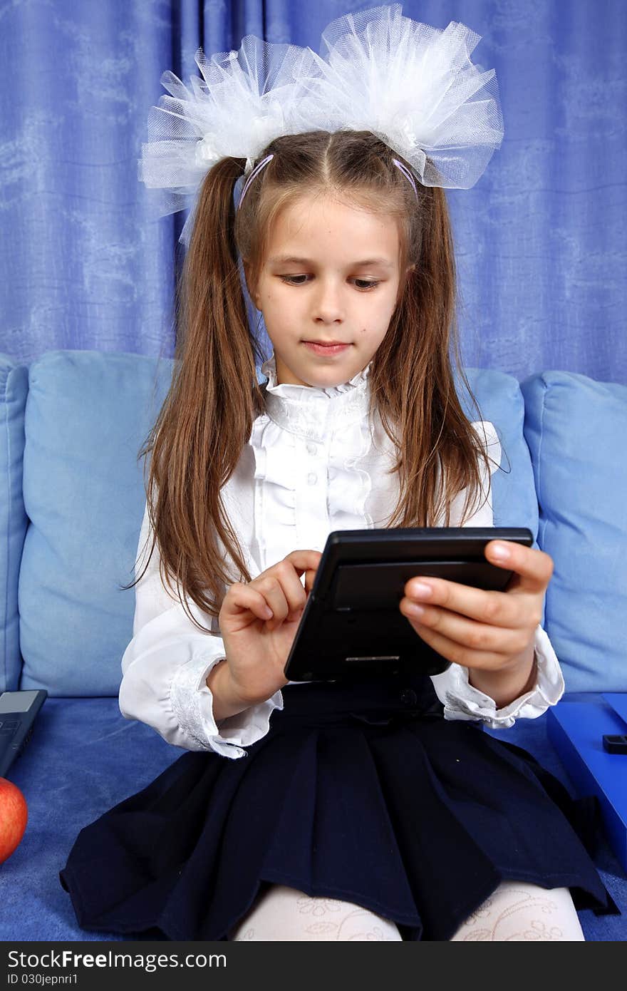 Schoolgirl with calculator