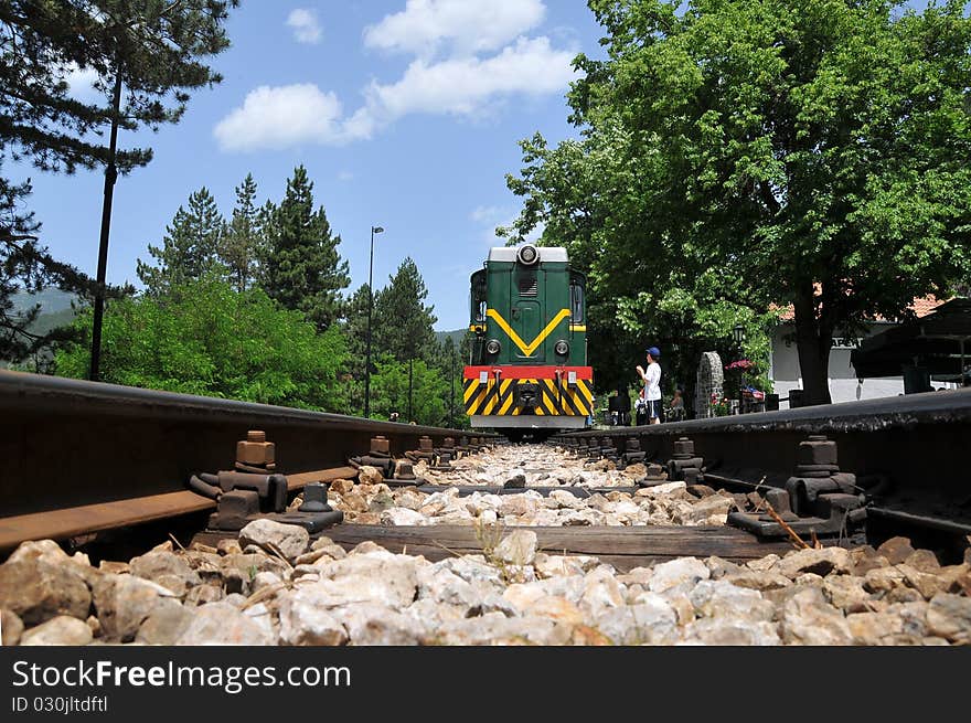 Railroad track with an locomotive.