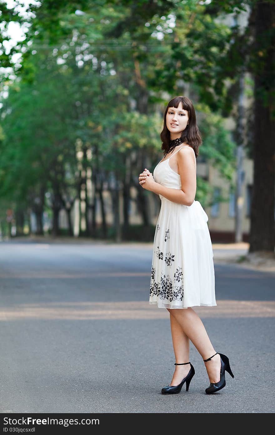 Portrait of naturally beautiful woman in her twenties, shot outside in natural sunlight