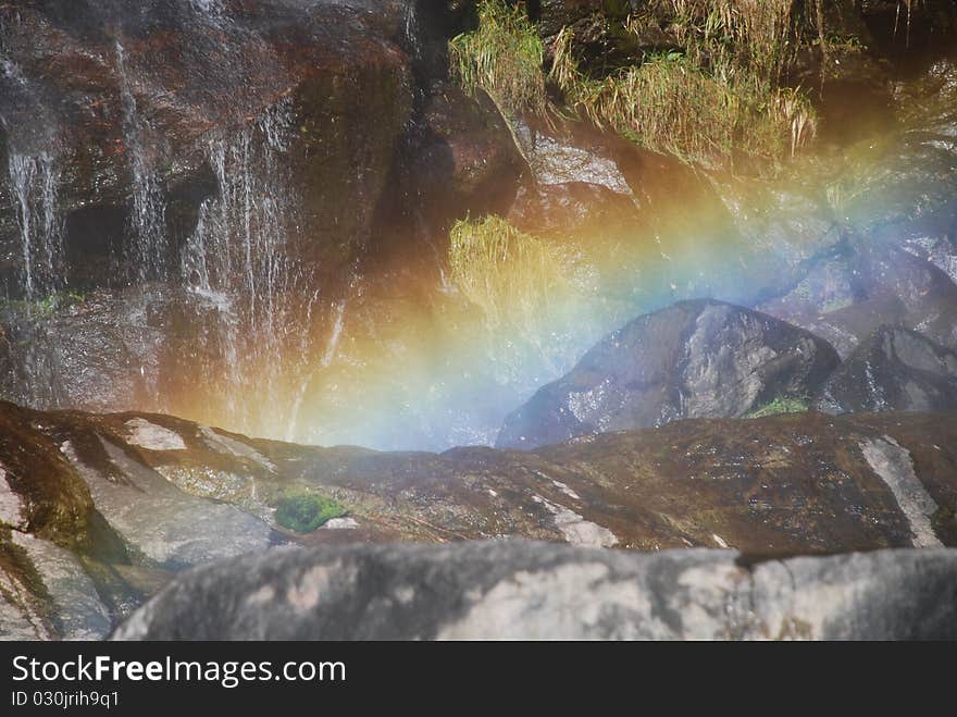 Rainbow on waterfall