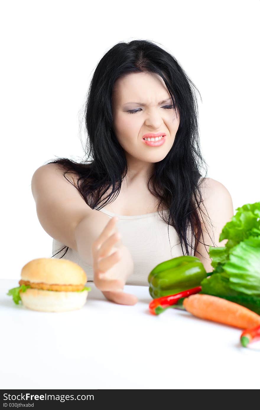 Beautiful woman  with vegetables over white background