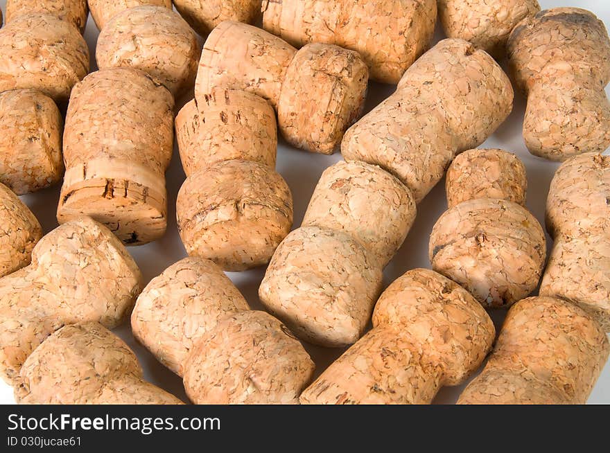 Pile of corks on a white background