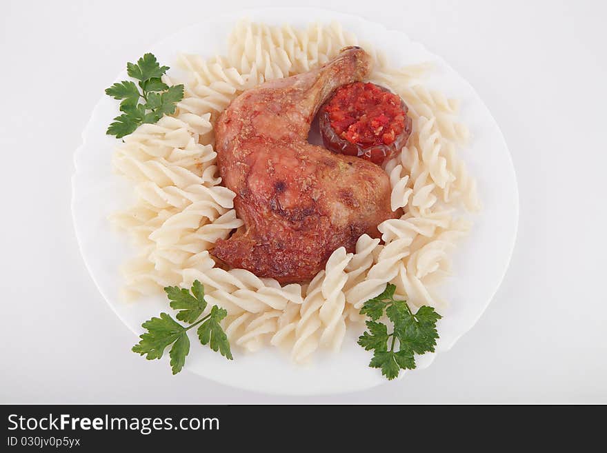 Grilled chicken on a plate with pasta. Grilled chicken on a plate with pasta