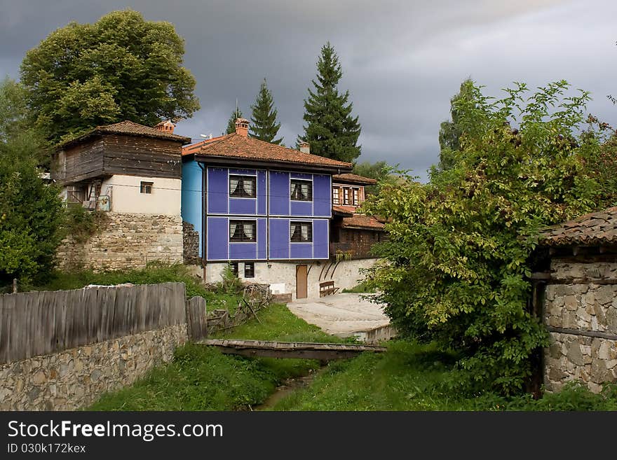 Traditional Bulgarian houses. Town of Koprivshtitsa depicted here. This image is taken with CPL Filter. Traditional Bulgarian houses. Town of Koprivshtitsa depicted here. This image is taken with CPL Filter.