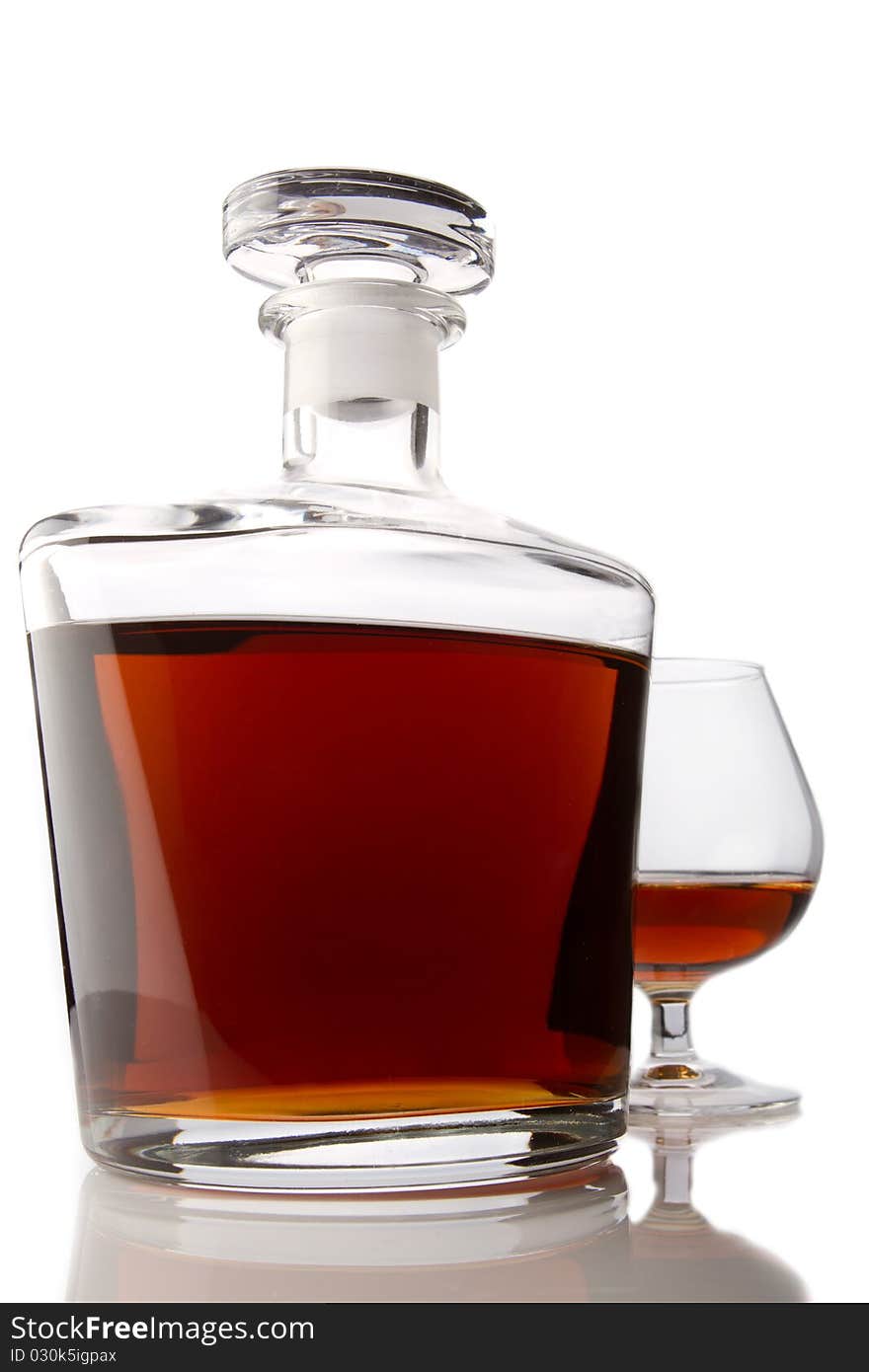 Cognac glass and bottle