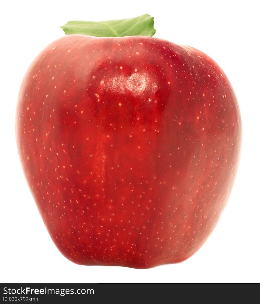 Red apple in a speck on a white background