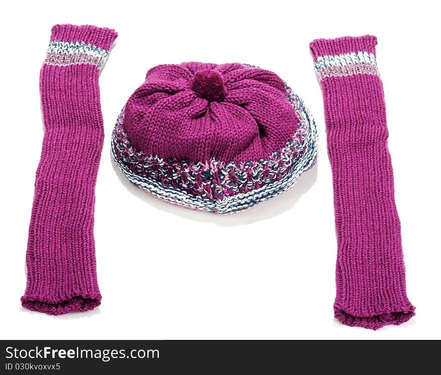 Violet knitted winter hat and sleeve covers on white background