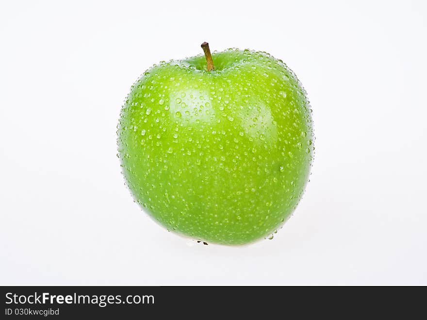 Green apple over white background - isolated