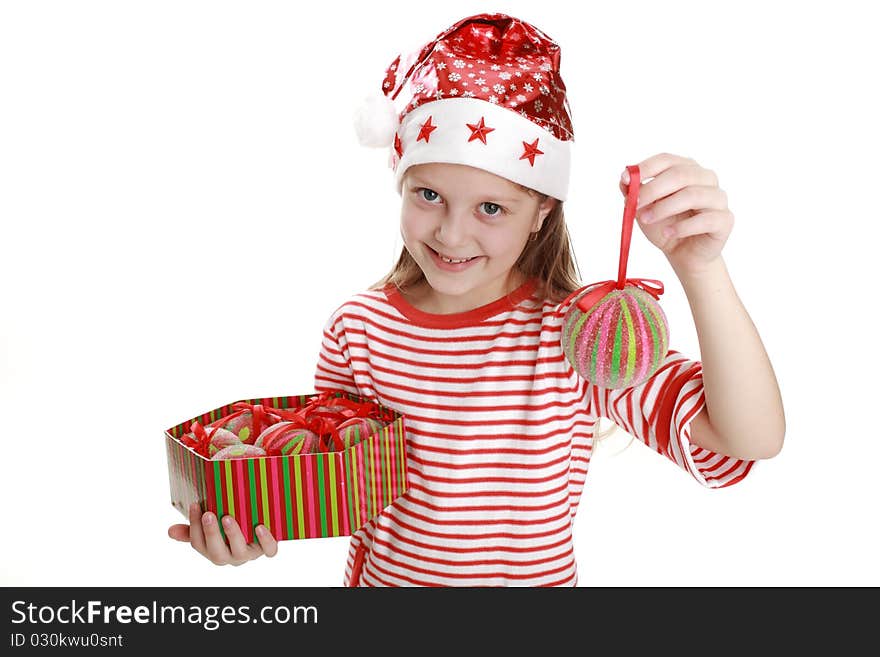 An image of a little girl with balls. An image of a little girl with balls