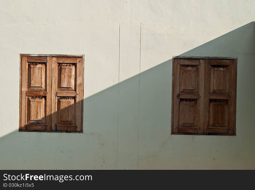 Window wood on a white wall