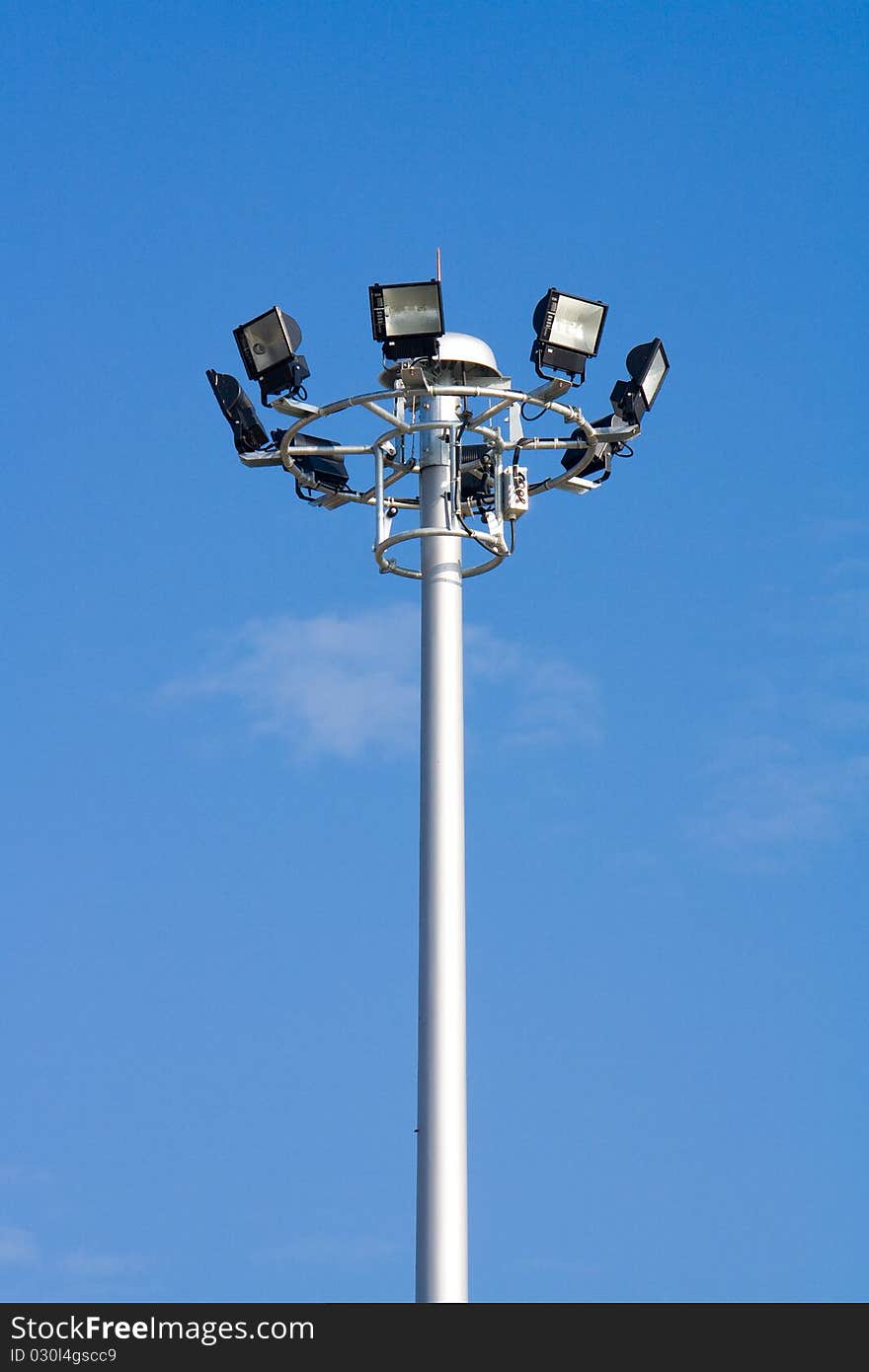 Tall street electricity post or lamp with eight lights in circle. Tall street electricity post or lamp with eight lights in circle.