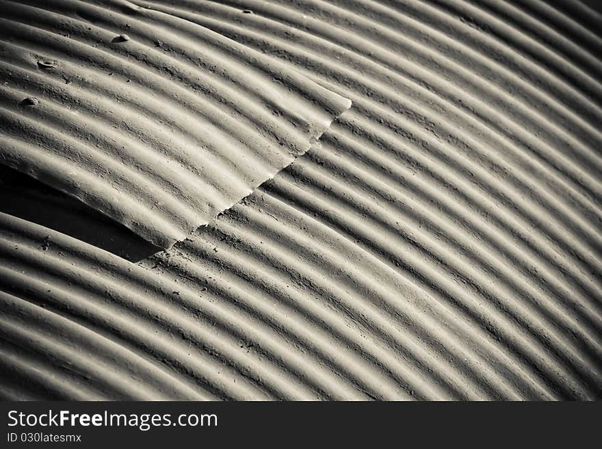 Rough surfaced background of rusting corrugated metal roofing. Rough surfaced background of rusting corrugated metal roofing