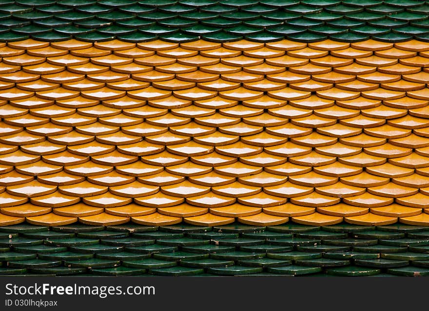 Traditional Thai style on temple's roof tile