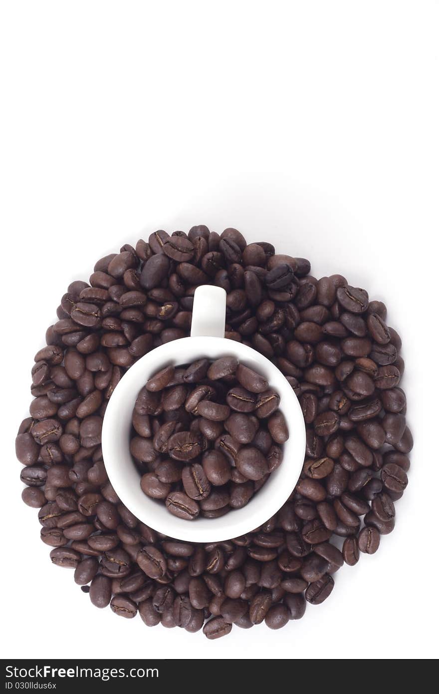 Cup Of Dark Roasted Coffee Beans