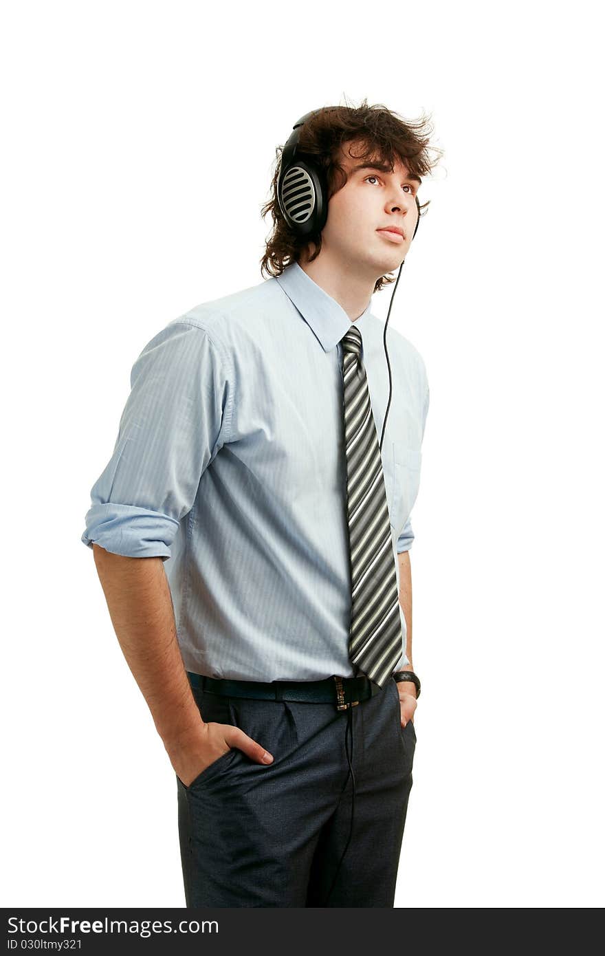 An image of a young man listening to music