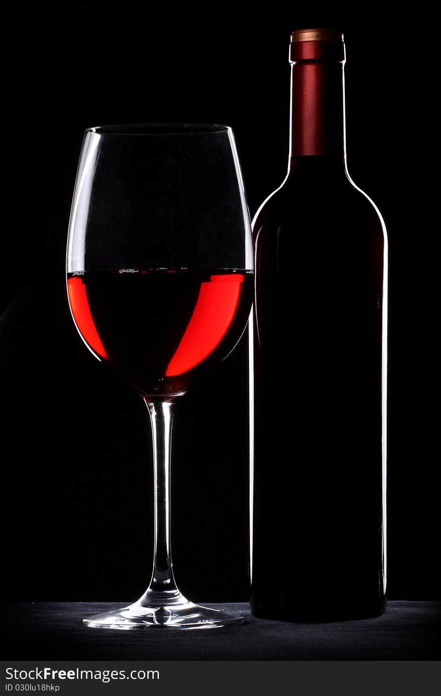 Red wine bottle and glass silhouette