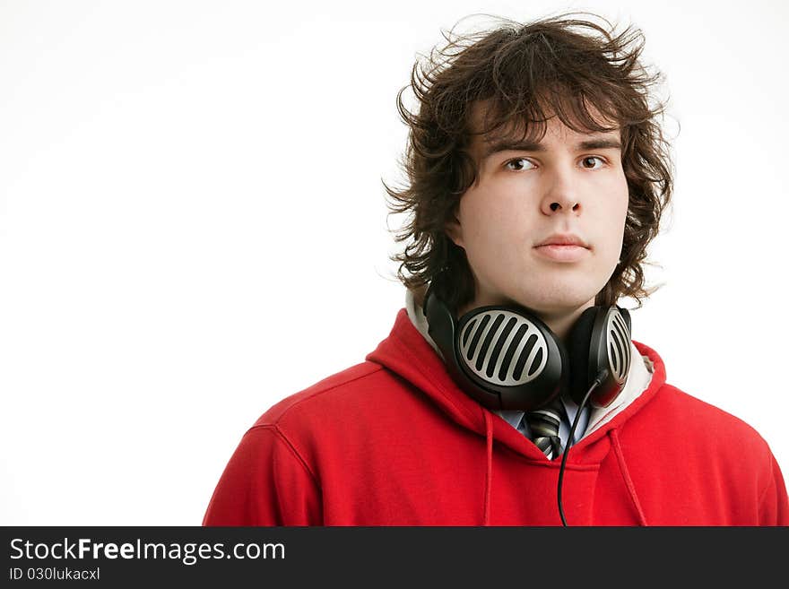 An image of a young man with big headphones. An image of a young man with big headphones