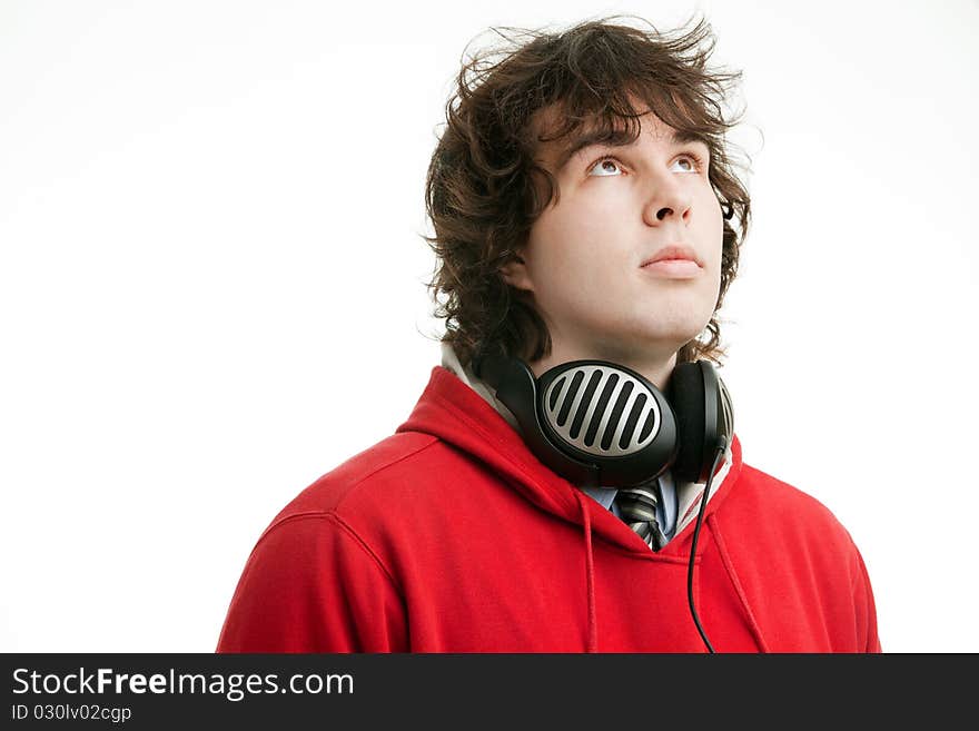 An image of a young man with big headphones. An image of a young man with big headphones