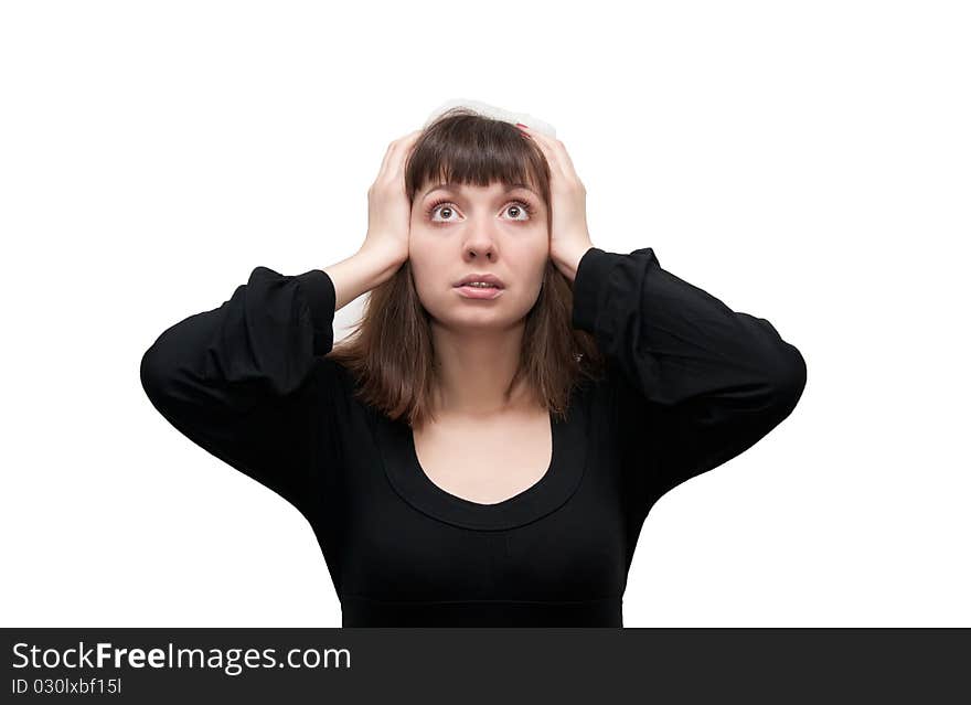 The girl is very surprised and frightened on a white background