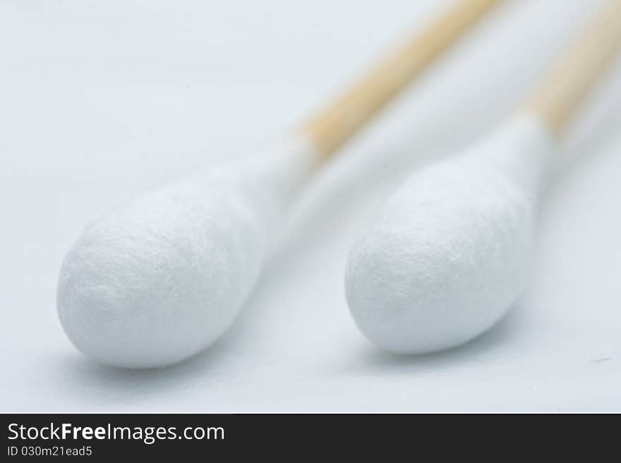 Cotton buds on white background