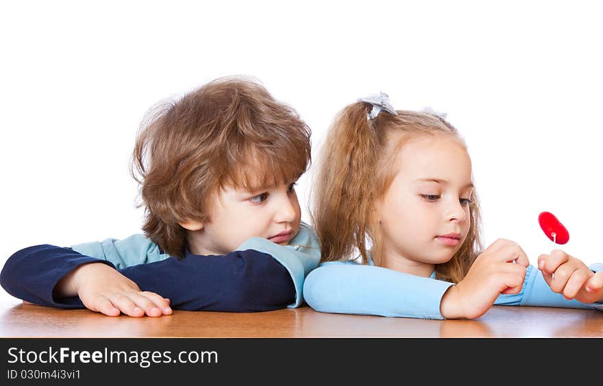 Little boy and girl in love. Isolated on white background