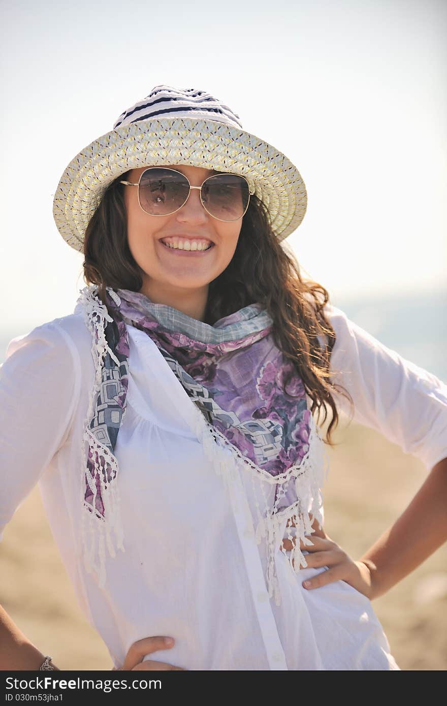 Happy young woman relax onbeautiful beach at morning. Happy young woman relax onbeautiful beach at morning