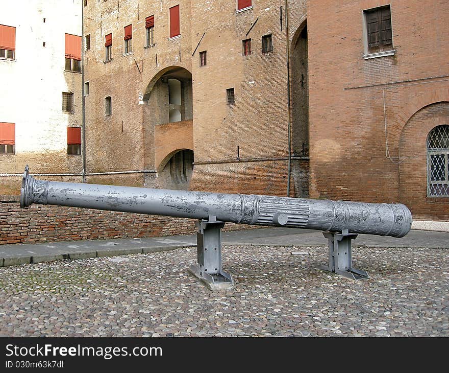 Antique cannon situated in front of Estense castle in Ferrara, Italy. Antique cannon situated in front of Estense castle in Ferrara, Italy.