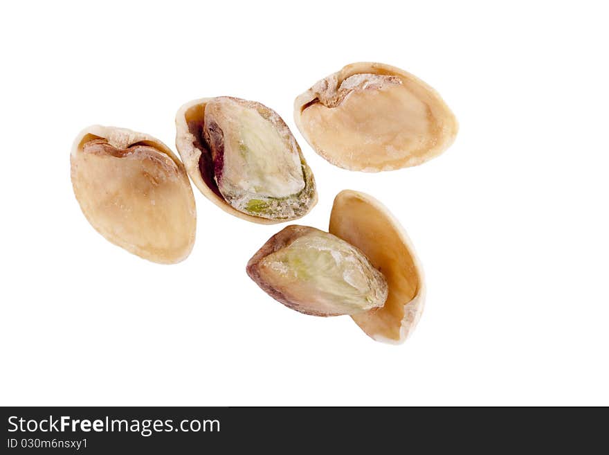 Open pistachios isolated on a white background.