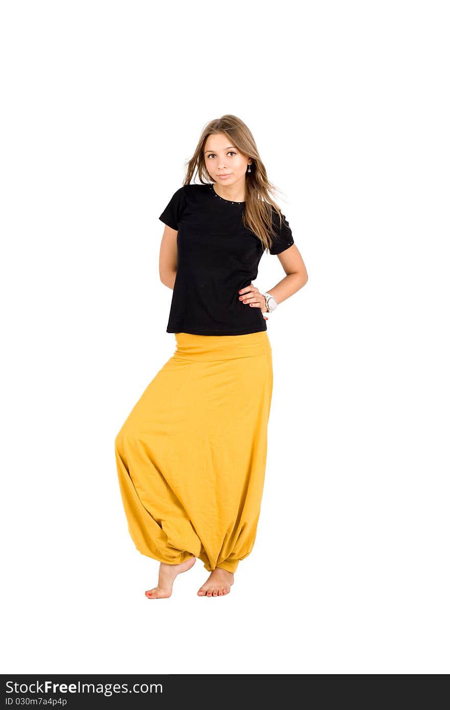 Smiling girl in yellow trousers