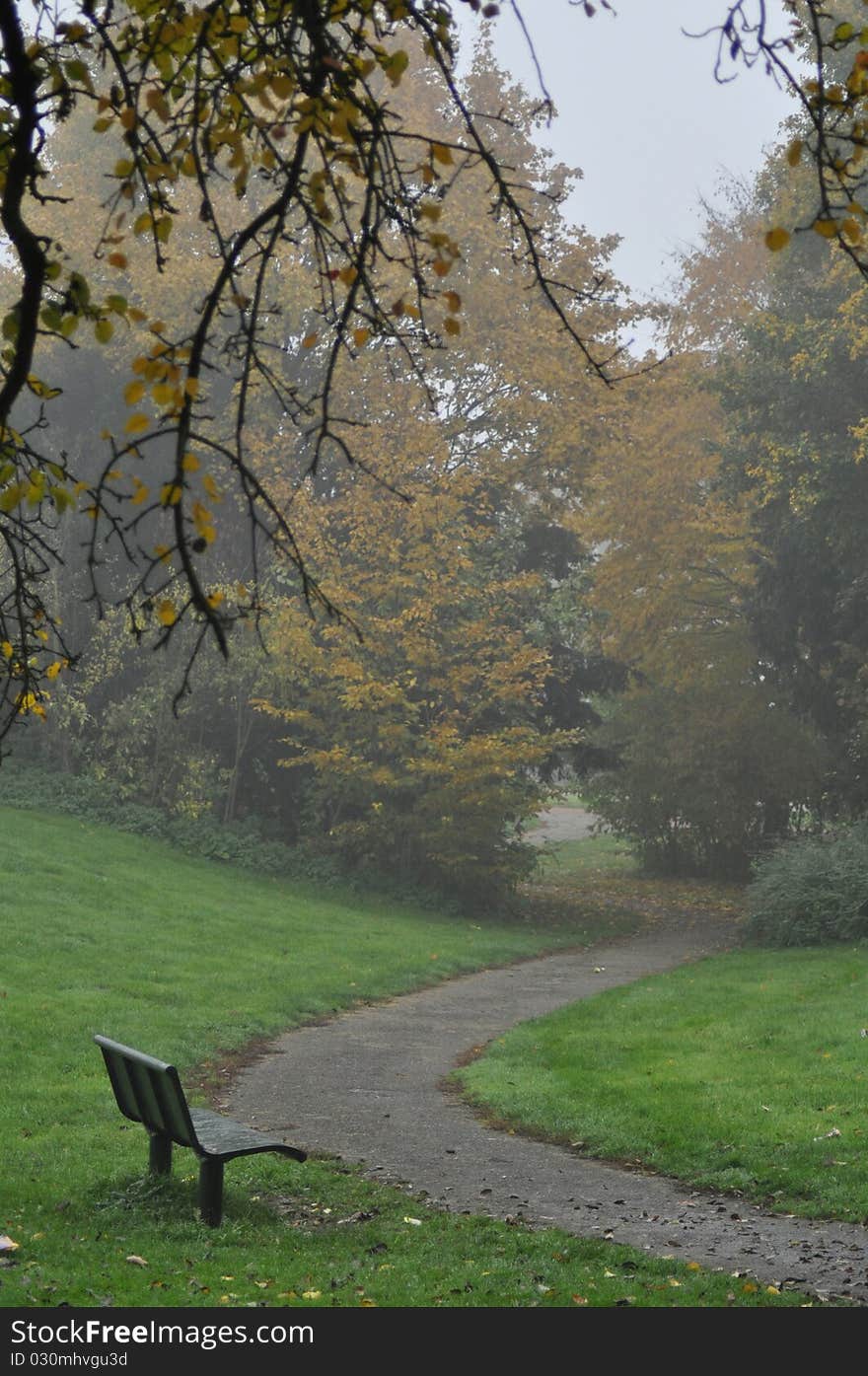 View park in autumn colors on a misty morning